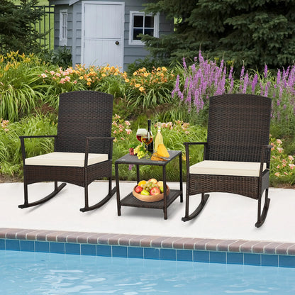 Costway Serenity 3 Piece Patio Rocking Wicker Rockers with White Cushions 2 Tier Coffee Table