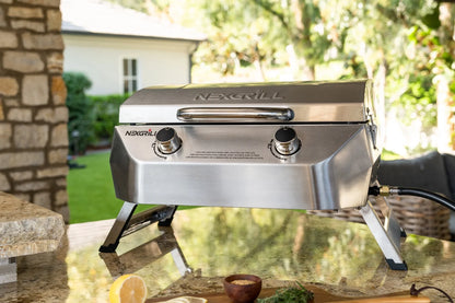 Nexgrill Stainless Steel 2-Burner Portable Gas Grill with Locking Lid, Folding Legs, 20,000 BTUs, 251 SQ In Cooking Space, Tabletop Grill for Camping, Outdoor Cooking, Patios, and More - 820-0007GE