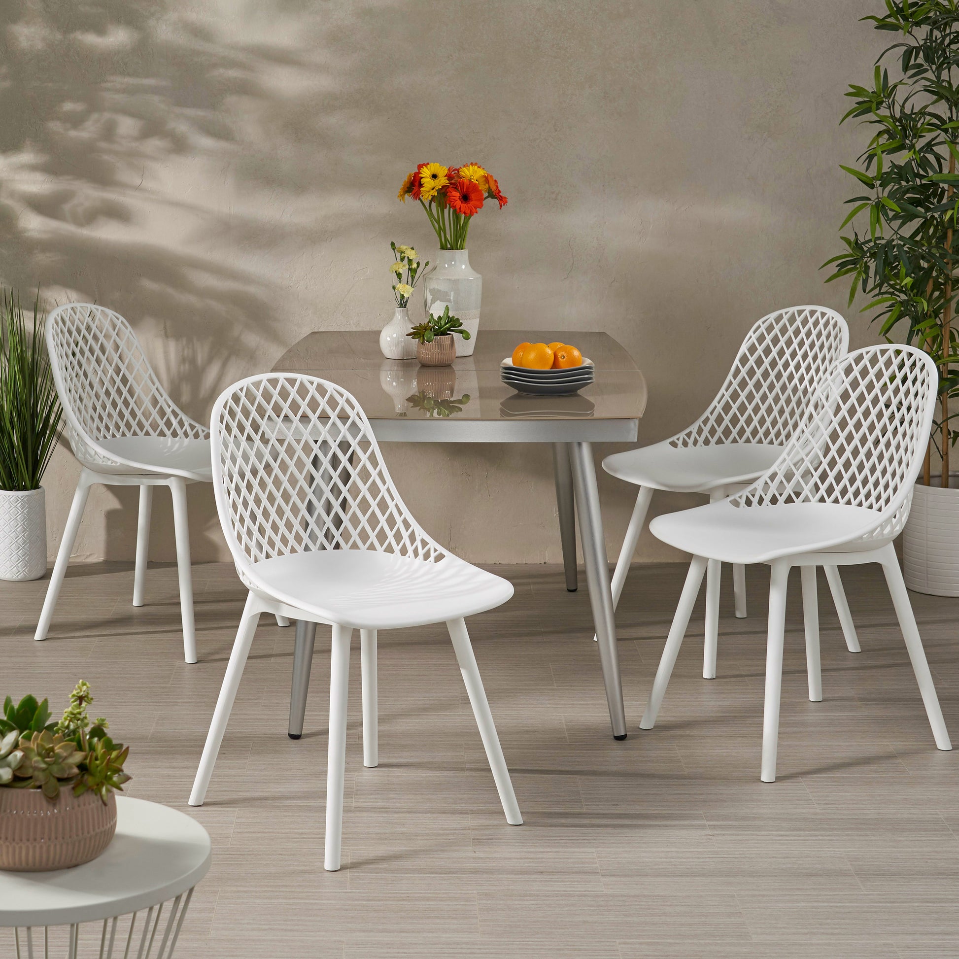 Noble House Lily Plastic Patio Dining Side Chair in White (Set of 4)